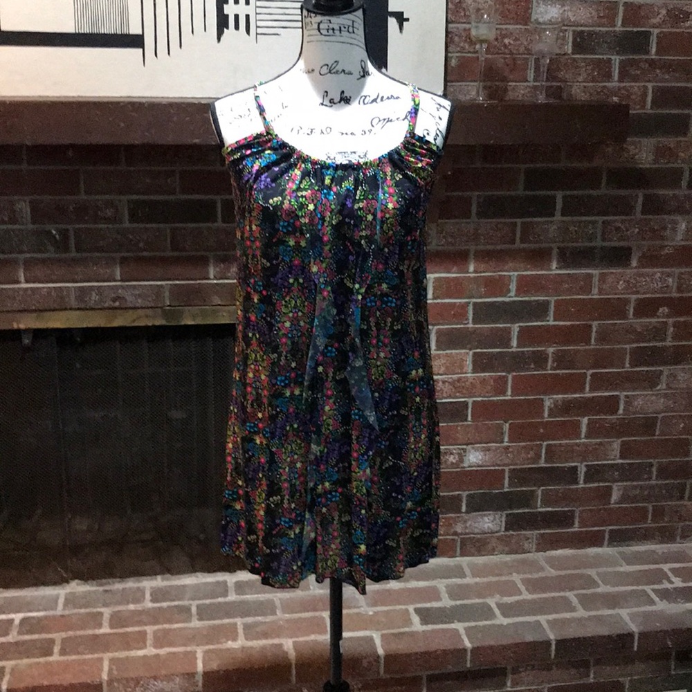 Groovy, floral, spaghetti strap minidress.
